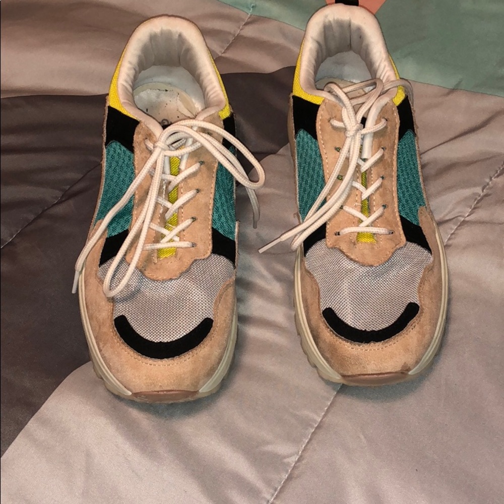 Bulky hip tennis shoes.